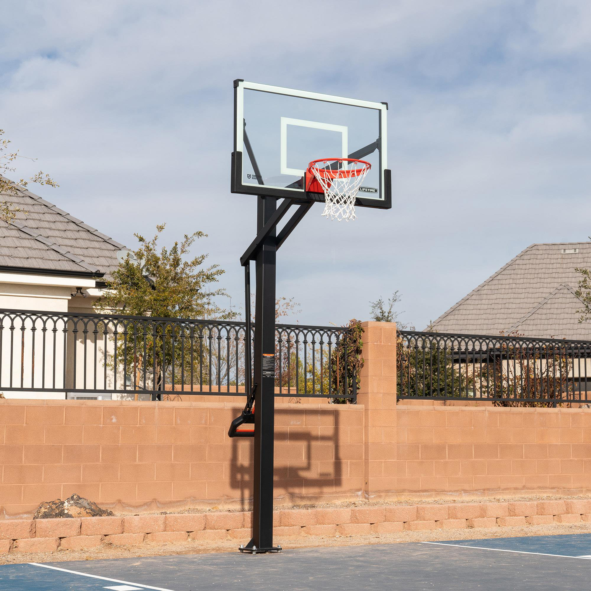 Lifetime Mammoth 54" Height Adjustable Bolt Down Basketball Hoop (Tempered Glass Backboard